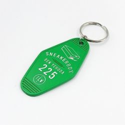 Green metal key chain with custom logo