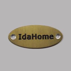 Oval brass etched logo metal plate with hole