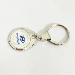 Motor key chain with company logo