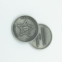 Embossed metal coin
